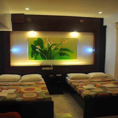 Jj Midcity Inn Tabaco Extérieur photo