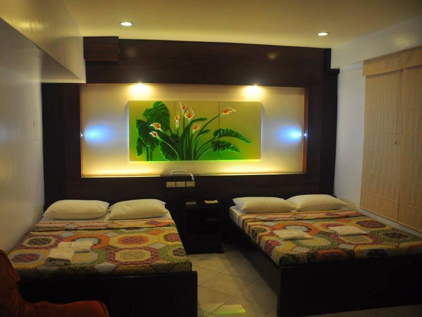 Jj Midcity Inn Tabaco Extérieur photo